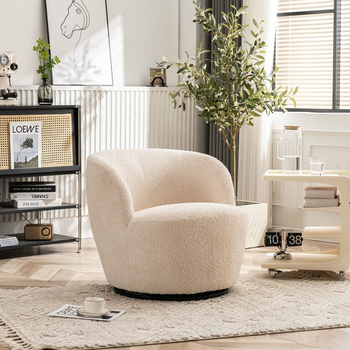 Aura Bouclé Swivel Armchair